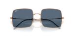 unisex γυαλιά ηλίου RAY-BAN RBR0104S 92023A Square Reverse με μεταλλικό σκελετό σε ροζ χρυσό και σκούρους μπλε φακούς.