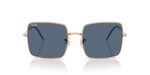 unisex γυαλιά ηλίου RAY-BAN RBR0104S 92023A Square Reverse με μεταλλικό σκελετό σε ροζ χρυσό και σκούρους μπλε φακούς.