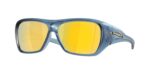 SPORT ανδρικά γυαλιά ηλίου OAKLEY OO9492 949205 Chaminade με ημιδιάφανο μπλε κοκάλινο σκελετό και χρυσούς Prizm 24k πολωτικούς φακούς.